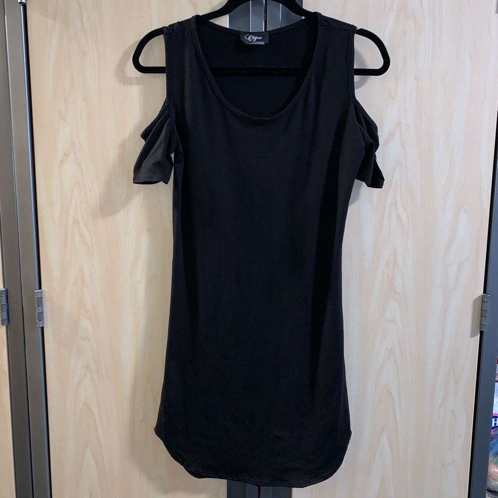 Form fitting black no shoulder dress